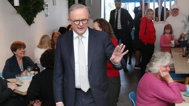 Anthony Albanese talks with locals about cost-of-living pressures at a Bayswater cafe in the marginal Victorian seat of Aston on Tuesday. Picture: David Crosling / NewsWire