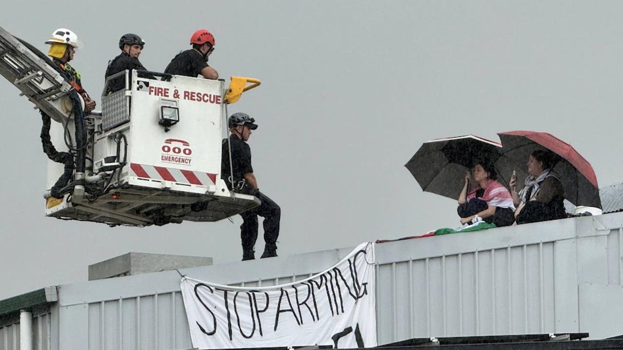 Pro-Palestine group Stop Ferra protests on Brisbane roof | The Cairns Post