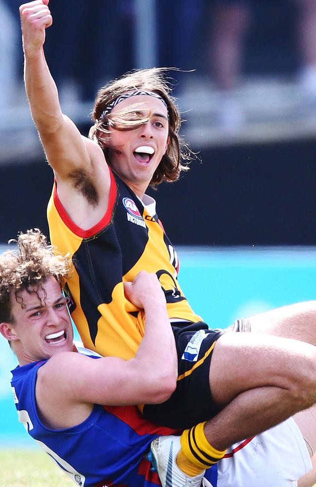 Fin Bayne celebrates a goal in the grand final.