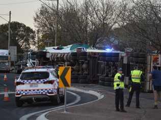 Emergency services at the scene of a cattle truck rollover near the corner of James and Cohoe Sts, Monday, August 20, 2018. Picture: Kevin Farmer