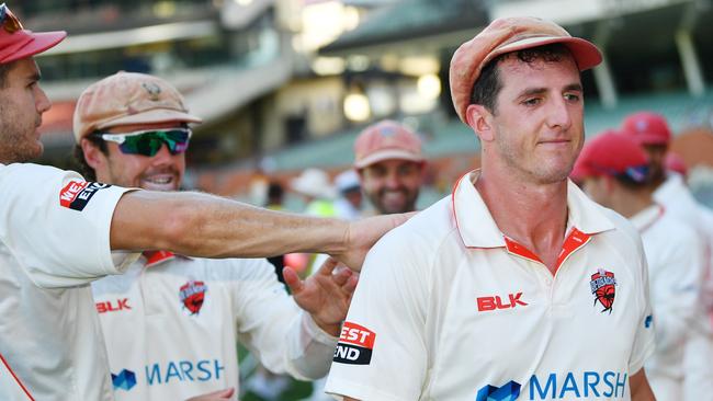 Daniel Worrall of the Redbacks walks from the field with team mates after day 4 of the Marsh Sheffield Shield match between the South Australia Redbacks and Western Australia Warriors at Adelaide Oval in Adelaide, Monday, February 17, 2020. (AAP Image/David Mariuz) NO ARCHIVING, EDITORIAL USE ONLY, IMAGES TO BE USED FOR NEWS REPORTING PURPOSES ONLY, NO COMMERCIAL USE WHATSOEVER, NO USE IN BOOKS WITHOUT PRIOR WRITTEN CONSENT FROM AAP