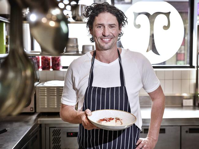 Colin Fassnidge at one of his restaurants. Picture: Flavio Brancaleone