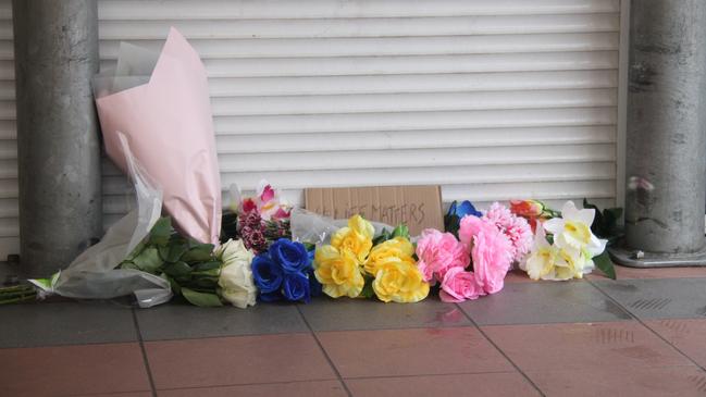 A memorial outside of Alice Springs Coles. NT Police are investigating the death of a 24-year-old man inside the supermarket, which occured while in police custody on May 27, 2025. Picture: Gera Kazakov