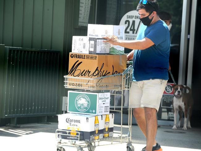 BRISBANE, AUSTRALIA - NewsWire Photos March 29, 2021: People are stacking up on alcohol from Dan Murphys in Holland Park for the COVID lock down. Picture: NCA NewsWire / John Gass