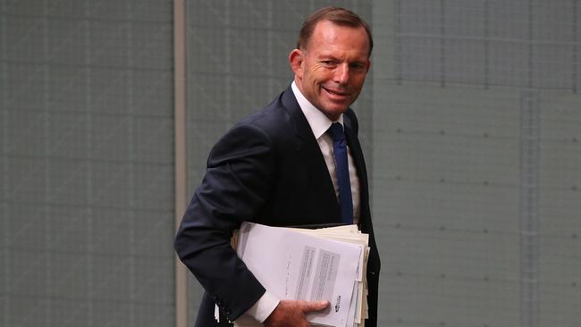 Tony Abbott leaving after Question Time in the House of Representatives Chamber, Parliament House in Canberra.