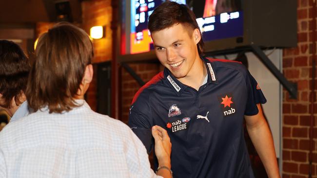 Sam Darcy celebrates with friends after being selected at pick 2. Picture: Mark Stewart