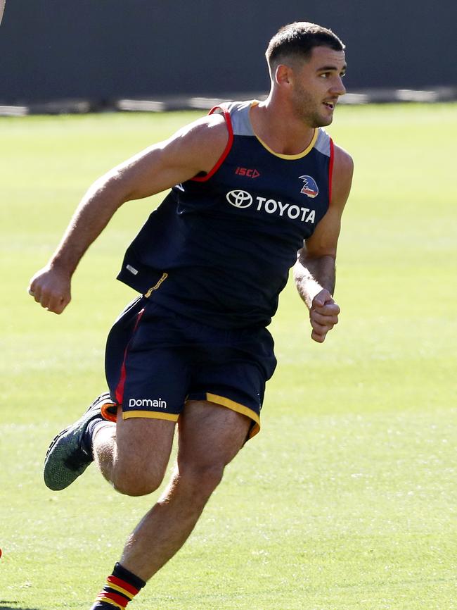 Taylor Walker puts in the hard yards at training earlier this season. Picture SARAH REED