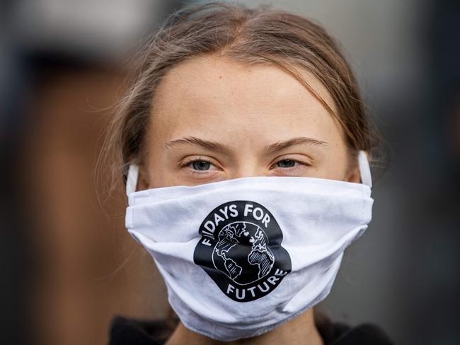 Swedish climate activist Greta Thunberg taking part in a Fridays For Future protest in front of the Swedish parliament. She has donated 100,000 euros from her foundation to the Covax scheme. Picture: AFP