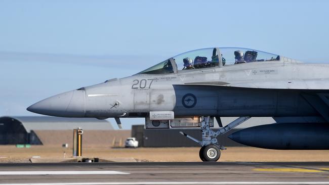 RAAF pilots and weapon system officers takes off from RAAF Base Townsville in F/A-18F Super Hornets during Exercise Crimson Dawn. Picture: Evan Morgan