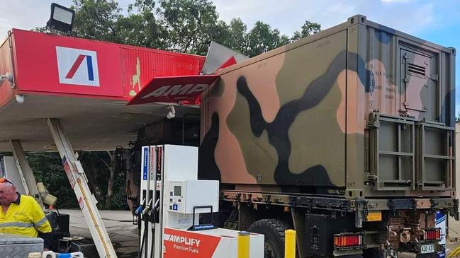 A military vehicle has destroyed an Ampol service station in Sarina, Queensland on May 14, 2024. Picture: Facebook