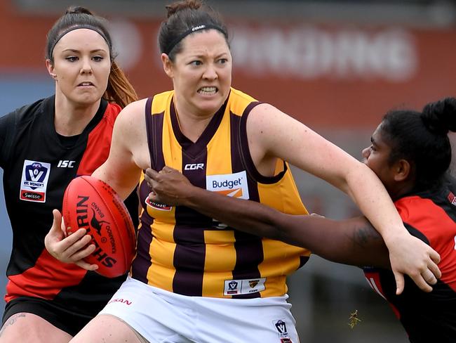 Jessica Sibley and 31 in action during the VFLW Essendon v Hawthorn football match  in Essendon, Saturday, June 15, 2019. Picture: Andy Brownbill