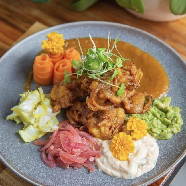 Little Black Pug's Pugkora: Vegan pakora with raita, mango chutney, pickles and avocado. Picture: Little Black Pug