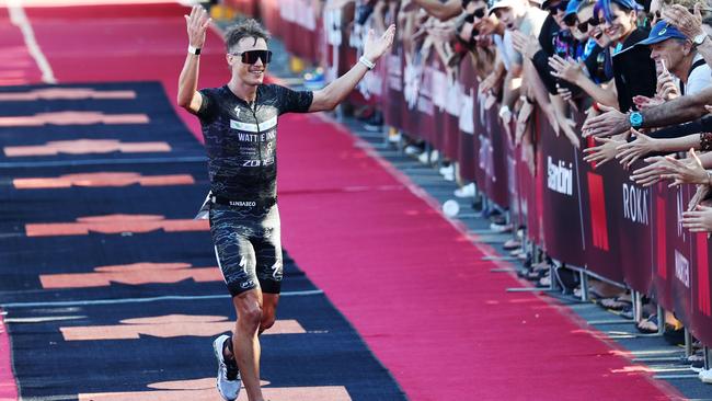 Josh Amberger was appreciative of the crowd as he crossed the finish line in third place in the 2021 Ironman Cairns race. Picture: Brendan Radke