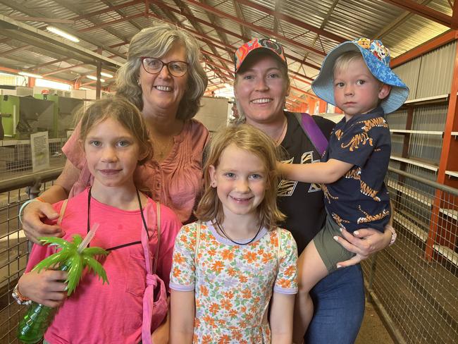 A family having fun at the Fraser Coast Show.