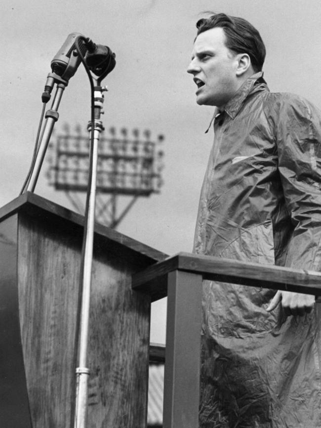 Billy Graham speaking at White City stadium, west London in 1955. Picture: Getty Images.