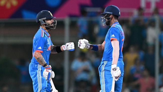 Virat Kohli (L) and KL Rahul are well in command in Chennai. (Photo by R.Satish BABU / AFP)