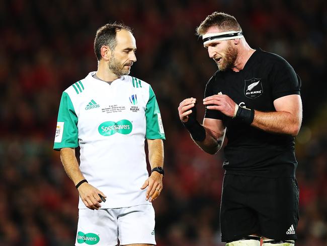 Kieran Read of the All Blacks talks to referee Romain Poite.