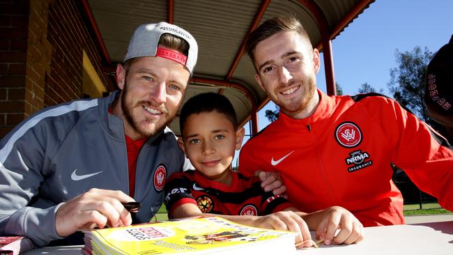 Wanderers Scott Jamieson and Jackson Bandiera hang out with the Doonside Hawks for a Community Day at Glendenning Reserve.