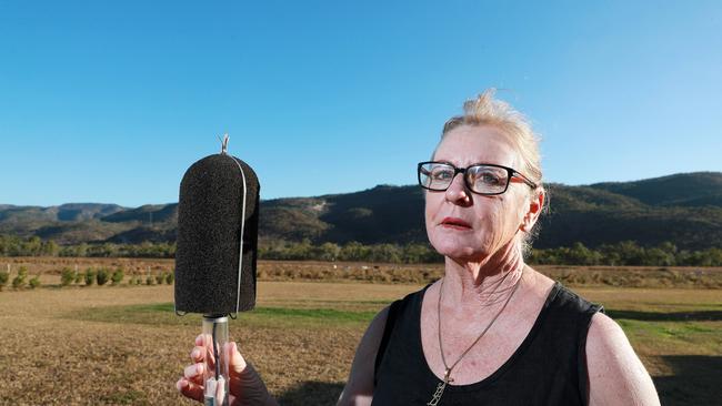 Jennifer Disley, from Walkamin Enterprises, at her place opposite the Mt Emerald wind turbine farm site. Jennifer is pictured with sound and visual monitoring equipment. Picture: Justin Brierty