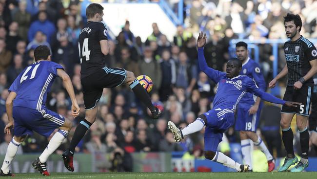 Chelsea's Ngolo Kante, second right, competes for the ball with West Brom’s  Darren Fletcher.