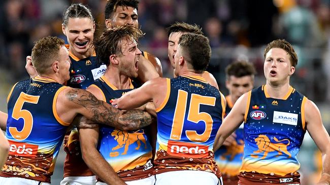 Rhys Mathieson and the Lions celebrates kicking a goal during the round 11 AFL match between the Brisbane Lions and the Hawthorn Hawks at The Gabba on June 01, 2019 in Brisbane, Australia. (Photo by Bradley Kanaris/AFL Photos/Getty Images)