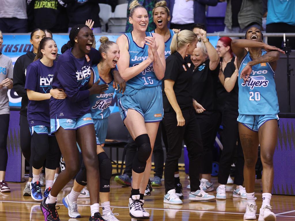 Southside Flyers celebrate winning game three of the WNBL Semi Final series. Picture: Getty Images