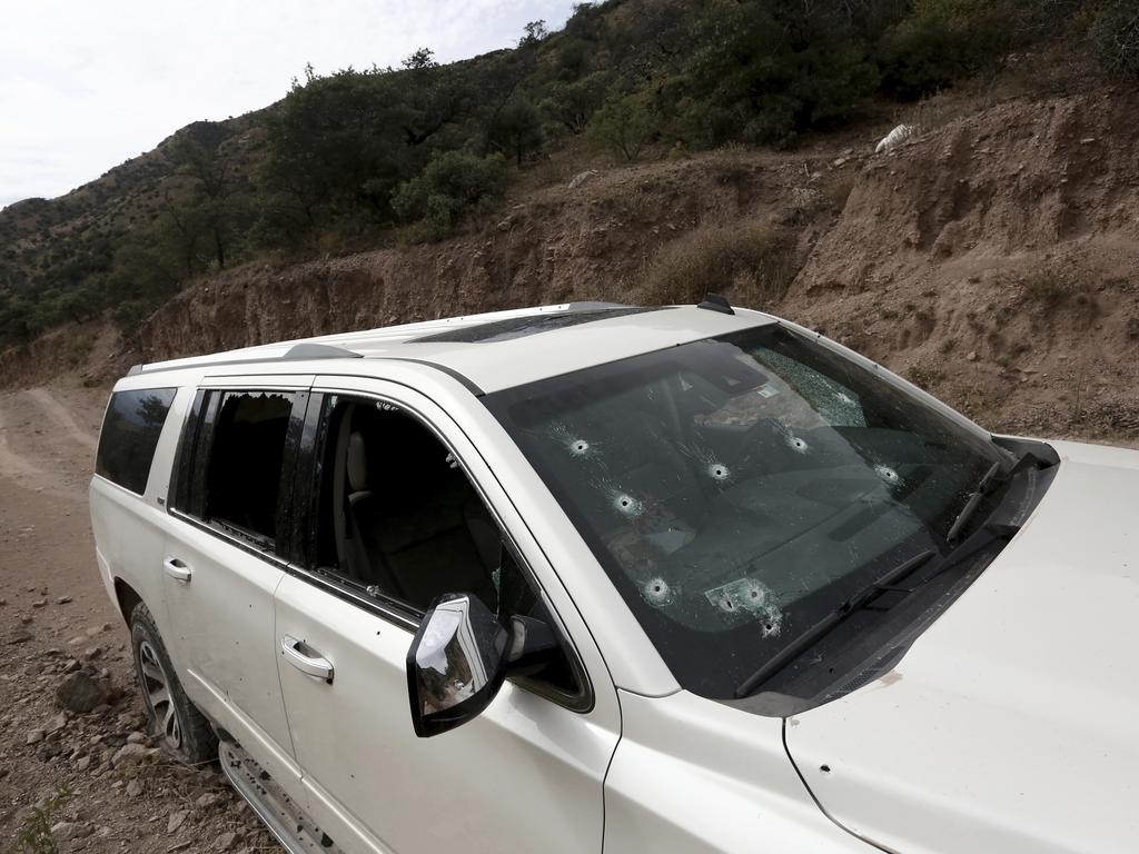 One of the SUVs full of bullet holes. Picture: Christian Chavez/AP