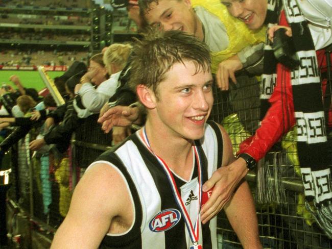 Mark McGough with the Anzac Medal after his best-afield effort in 2002.