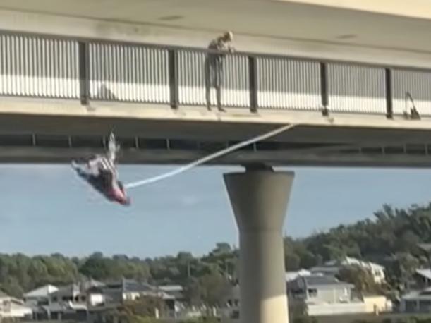 A man bungee jumps off the Dawesville Bridge in Mandurah. picture : facebook