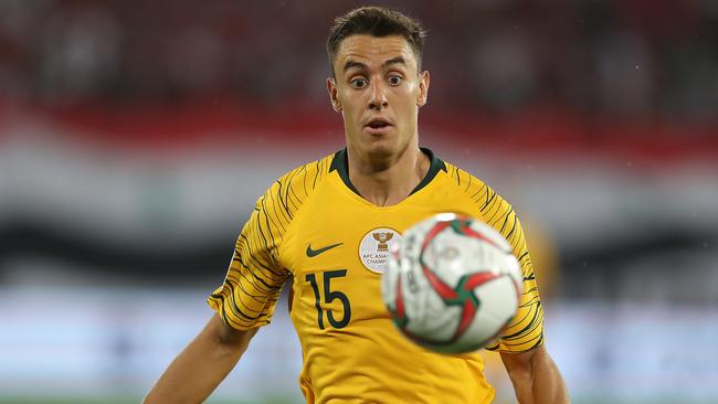 Chris Ikonomidis has eyes for the ball against Syria. Picture: Getty Images.