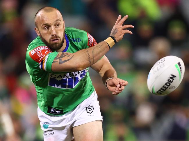 CANBERRA, AUSTRALIA - JUNE 12: Josh Hodgson of the Raiders passes during the round 14 NRL match between the Canberra Raiders and the Brisbane Broncos at GIO Stadium, on June 12, 2021, in Canberra, Australia. (Photo by Mark Nolan/Getty Images)