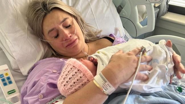 Danielle holds her newborn Bette shortly after her emergency surgery. Picture: Supplied