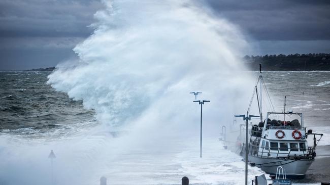 A huge wave crashes into the Mornington Pier during wild weather earlier this year. Picture: Vaughan Laws