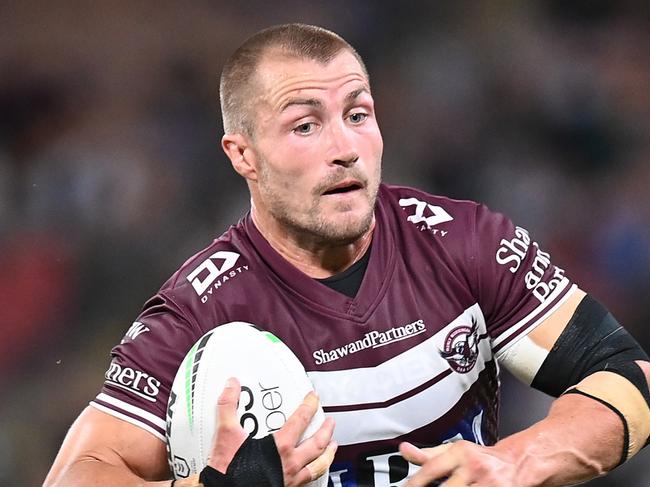 BRISBANE, AUSTRALIA - SEPTEMBER 24:  Kieran Foran of the Sea Eagles makes a break during the NRL Preliminary Final match between the South Sydney Rabbitohs and the Manly Sea Eagles at Suncorp Stadium on September 24, 2021 in Brisbane, Australia. (Photo by Bradley Kanaris/Getty Images)