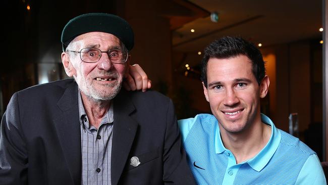 Former Socceroo Stephen Herczeg pictured with current player Ryan McGowan in March last year. Photo: Sarah Reed.