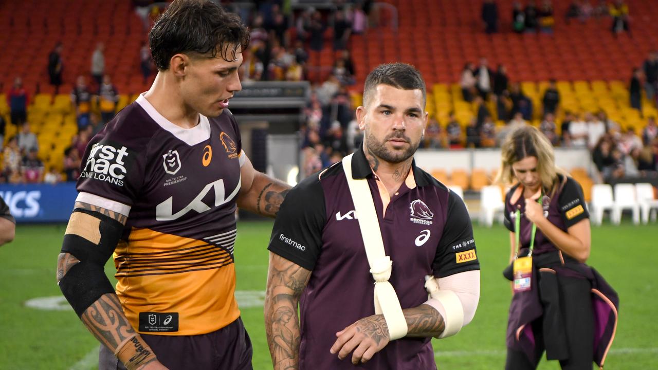 Jordan Riki consoles Adam Reynolds after the match against the Roosters. Picture: NRL Imagery