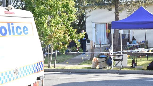 Forensics officers are still on scene on Sunday afternoon after 38-year-old Christopher Anderson was shot dead outside his home on Old Logan Rd, Gailes. Photo: Ebony Graveur