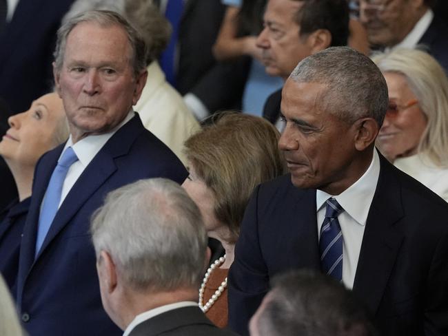 Former President George W. Bush, Laura Bush and former President Barack Obama arrive before the 60th Presidential Inauguration. Picture: AP Photo/Julia Demaree Nikhinson, Pool