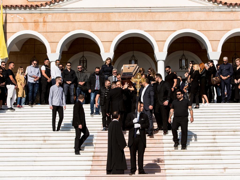 John Macris’ casket is taken out of the church at his funeral in Greece. Picture: Angelos Christofilopoulos/ News Corp