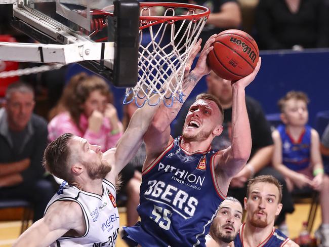 Mitch Creek goes to the basket for the 36ers. Picture Sarah Reed