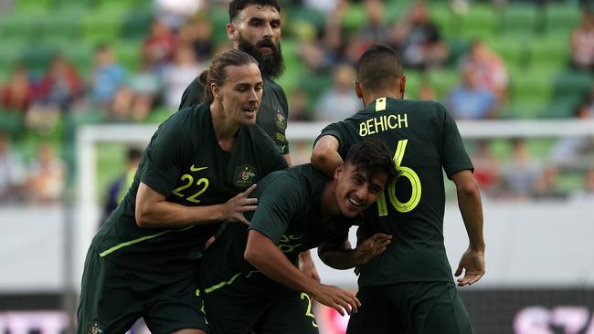 Daniel Arzani celebrates scoring with teammates Jackson Irvine, Mile Jedinak and Aziz Behich. Picture: Toby Zerna