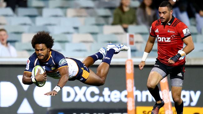 Henry Speight of the Brumbies dives to score a try at GIO Stadium.