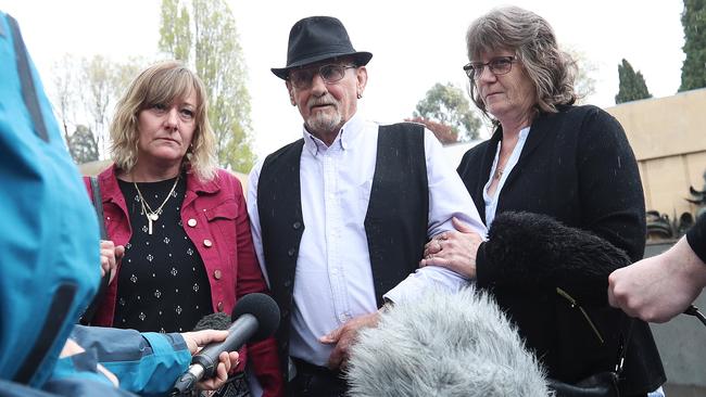 Dwayne Davies’ sister Kelly Goss, left, father Glen Davies and step-mother Karen Davies speak outside the Supreme Court in Hobart after the sentencing. Picture: LUKE BOWDEN