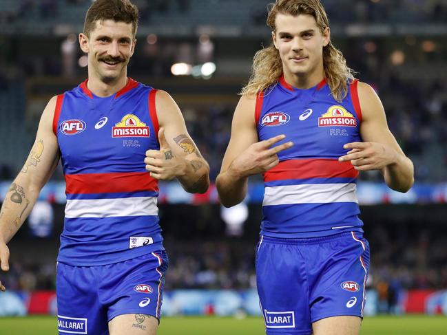 MELBOURNE, AUSTRALIA - MAY 22: Tom Liberatore (left) and Bailey Smith of the Bulldogs celebrate during the 2021 AFL Round 10 match between the Western Bulldogs and the St Kilda Saints at Marvel Stadium on May 22, 2021 in Melbourne, Australia. (Photo by Michael Willson/AFL Photos via Getty Images)