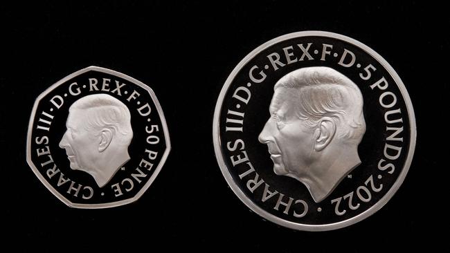 A fifty pence piece, left and a special Â£5 crown to be issued by the Royal Mint. Picture: AFP