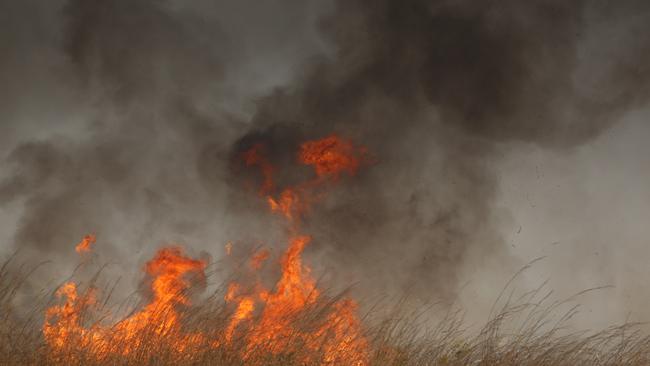 Multiple crews remain on the scene of a large Kilkivan grass fire this morning. File photo.