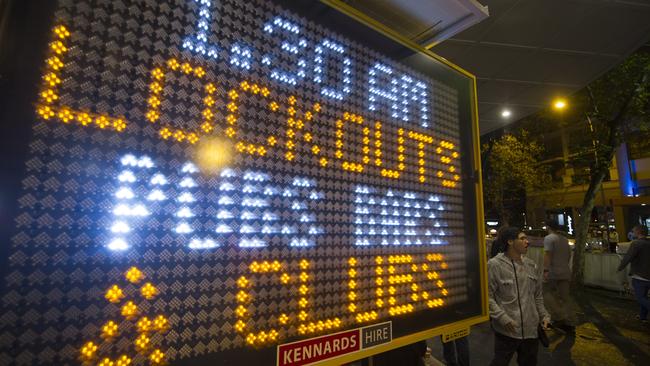 Electronic signs in Kings Cross warn of the Sydney lockout laws.