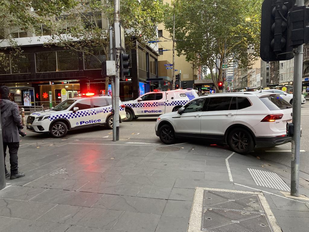 Police have swarmed Elizabeth St in the wake of two separate attacks. Picture: Brandon Demura