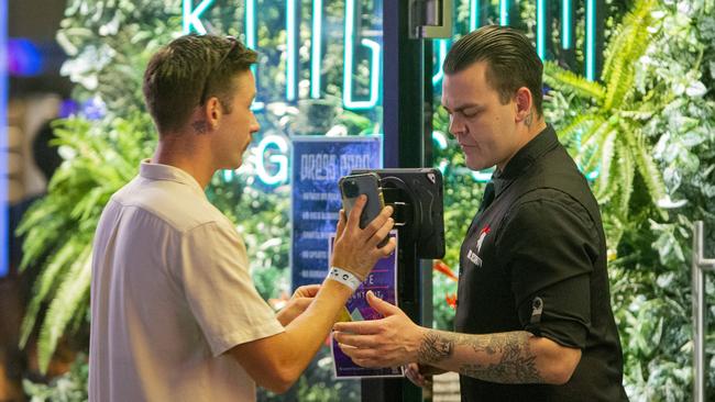 Staff at Lost Kingdom Nightclub in Surfers Paradise check vaccination status of patrons on entry. Picture: Jerad Williams