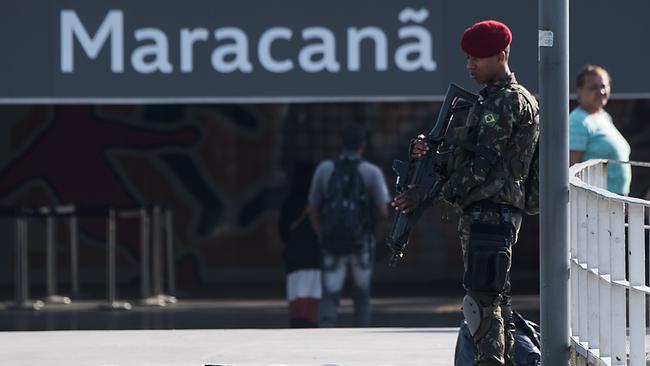 Brazilian paratroops stand guard outside the Maracana stadium in Rio. Picture: AFP